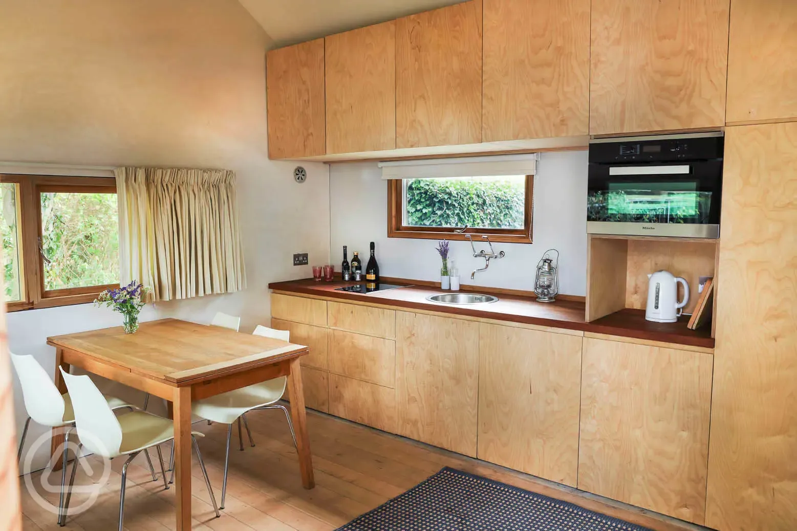 The Boat Shed kitchenette and seating area