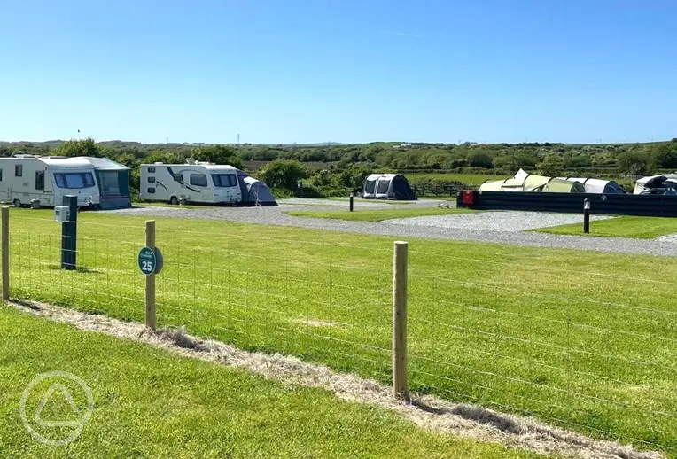 Cymunod electric grass and gravel touring pitches