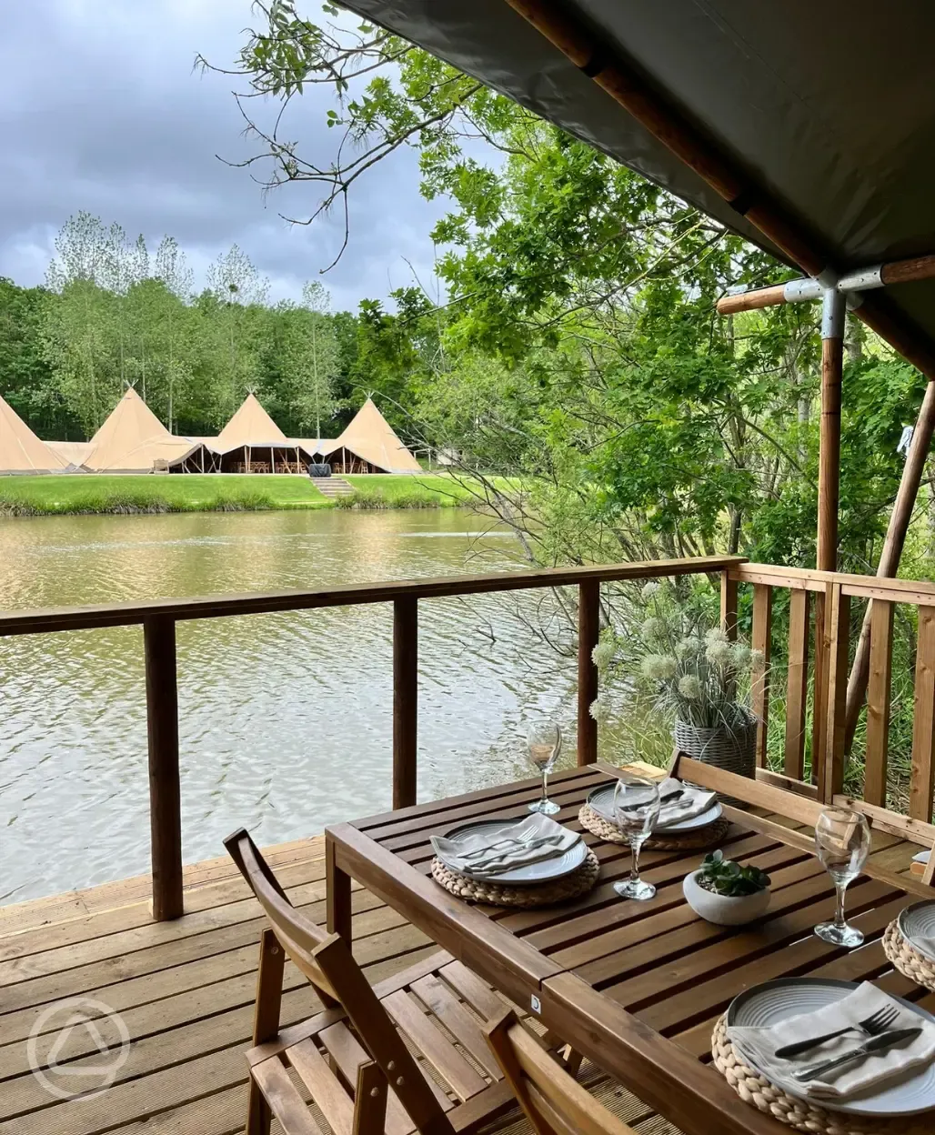 View across the fishing lake from Teal safari tent