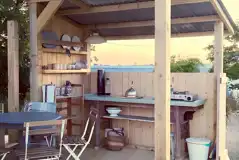 Kitchen area outside the bell tents on deckings