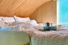 Wilderness hut raised king-sized bed Wilderness hut raised king-sized bed