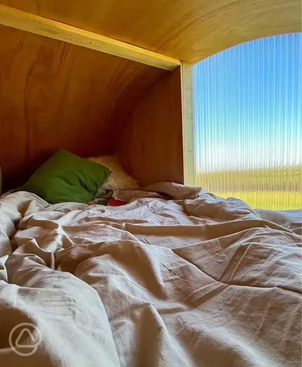 Wilderness hut raised king-sized bed