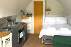 Gold glamping pod interior