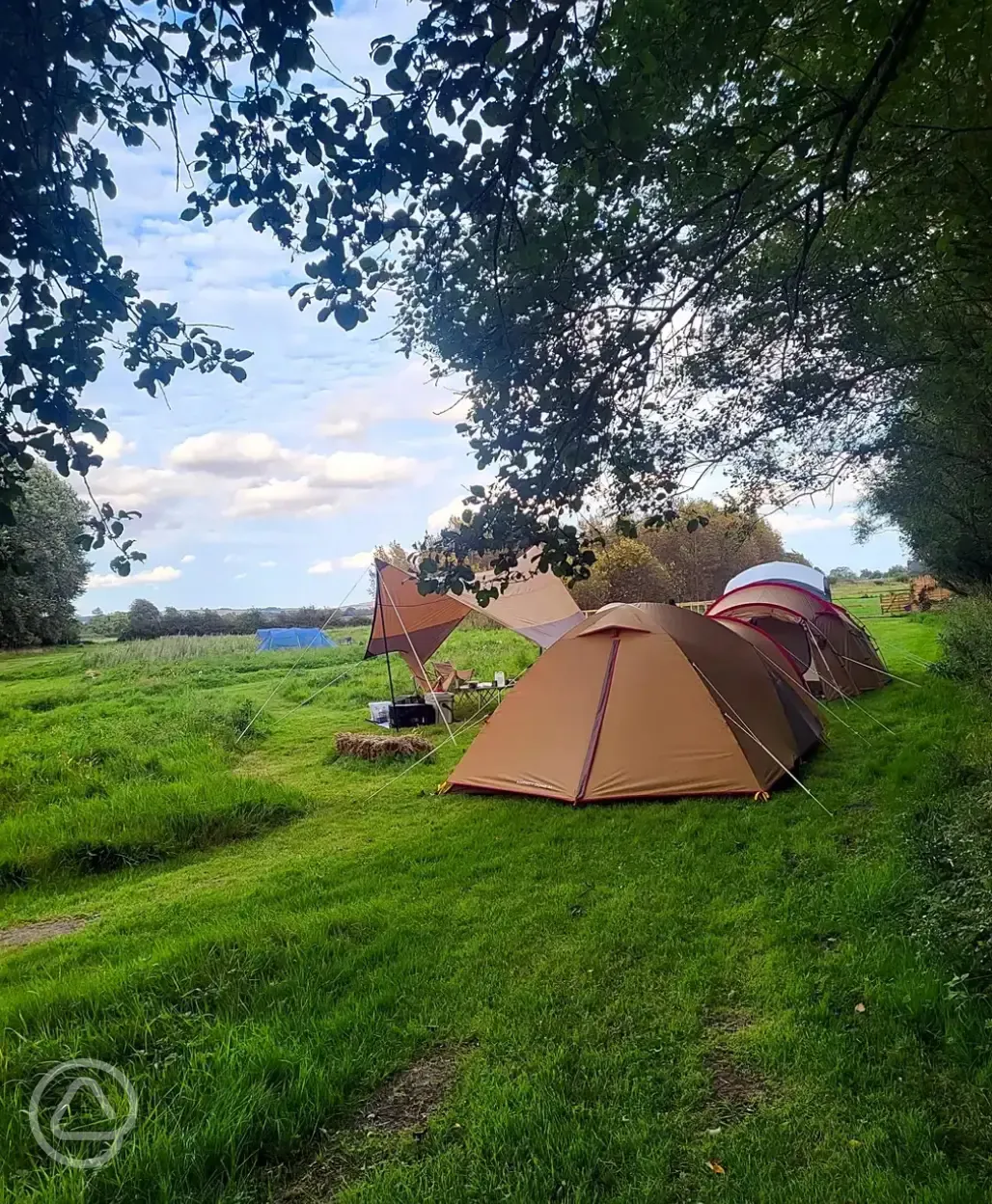 Non electric grass tent pitches