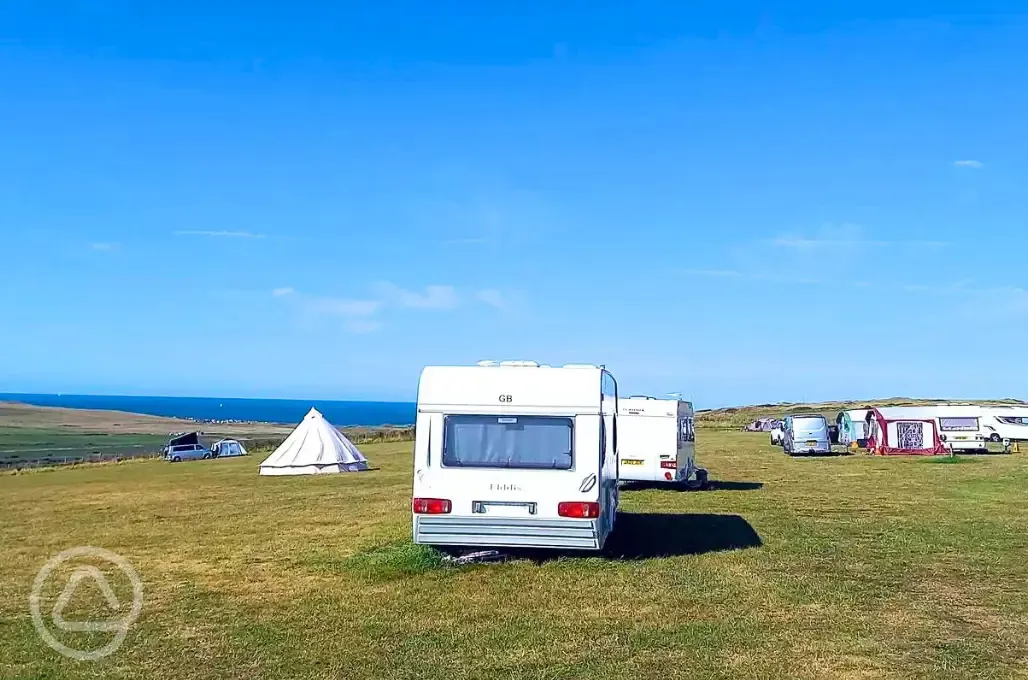 Non electric grass pitches and sea views