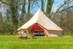 Two person bell tent with a picnic bench and fire pit Two person bell tent with a picnic bench and fire pit