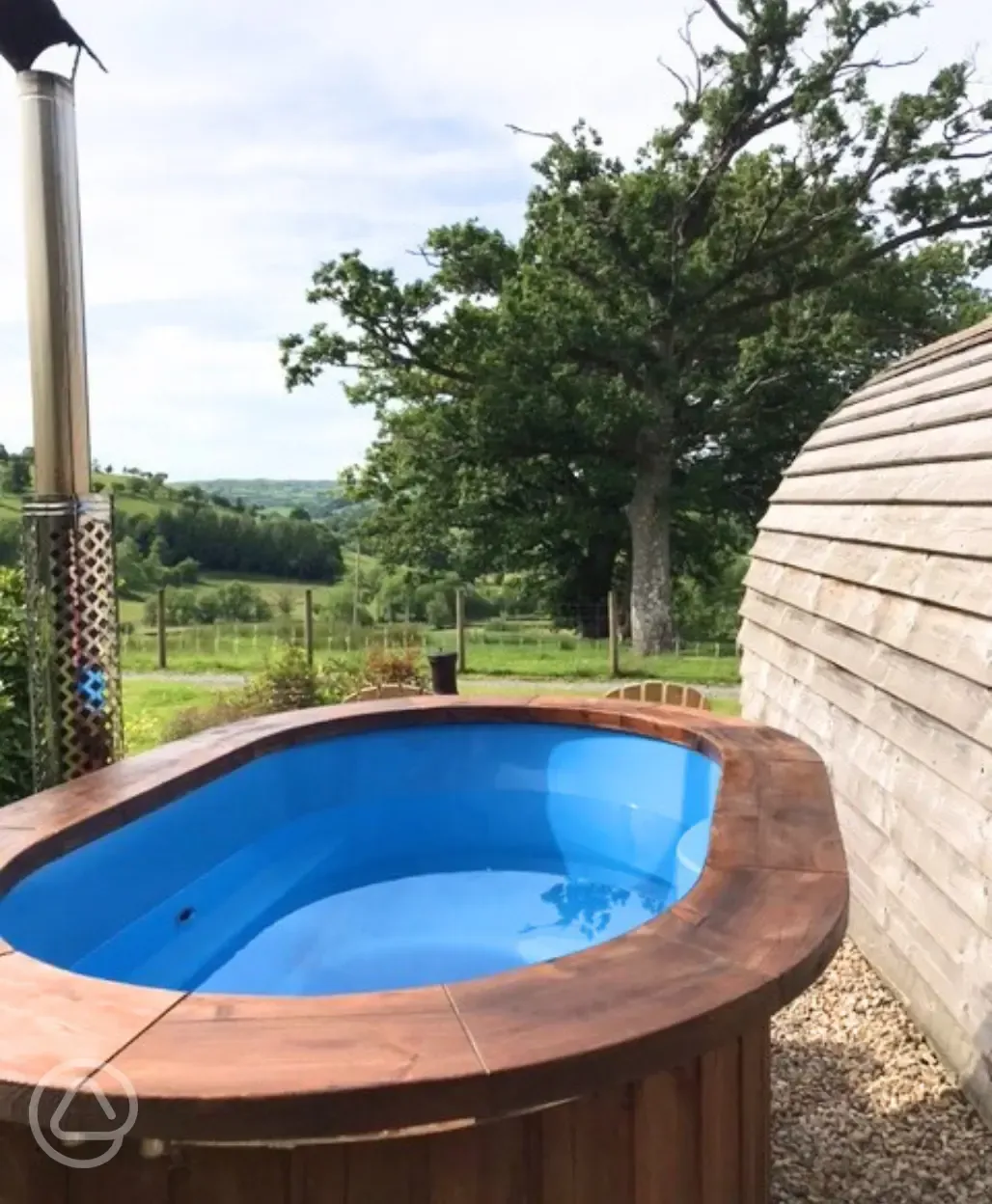 Glamping pod with hot tub