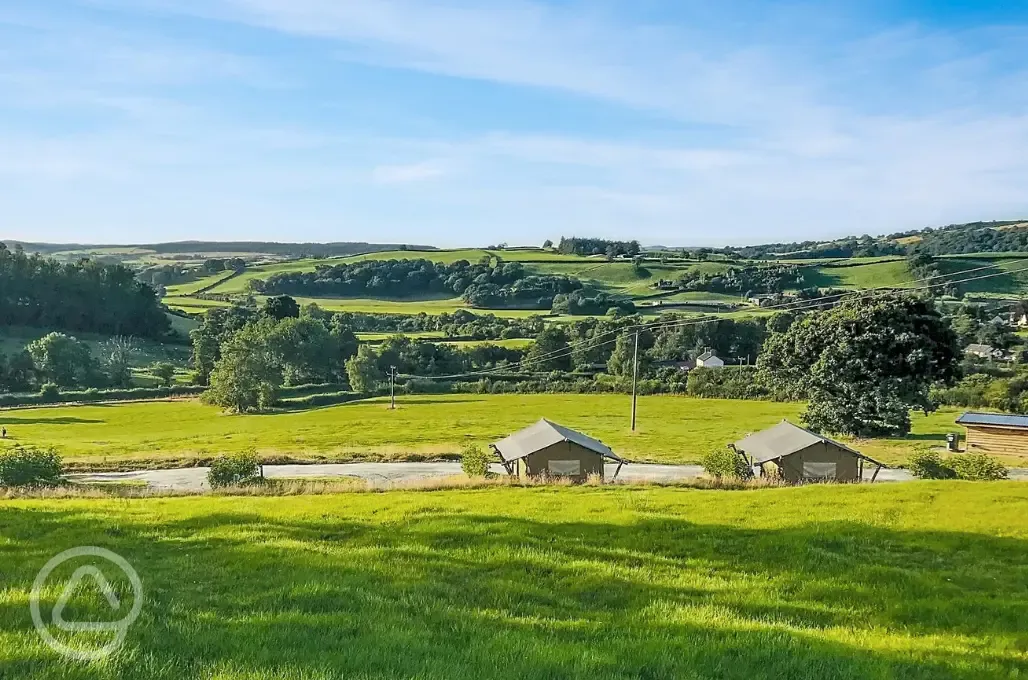 Safari tents and countryside views