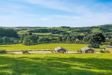 Safari tents and countryside views