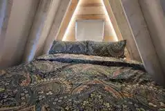 Glamping cabin mezzanine bedroom 