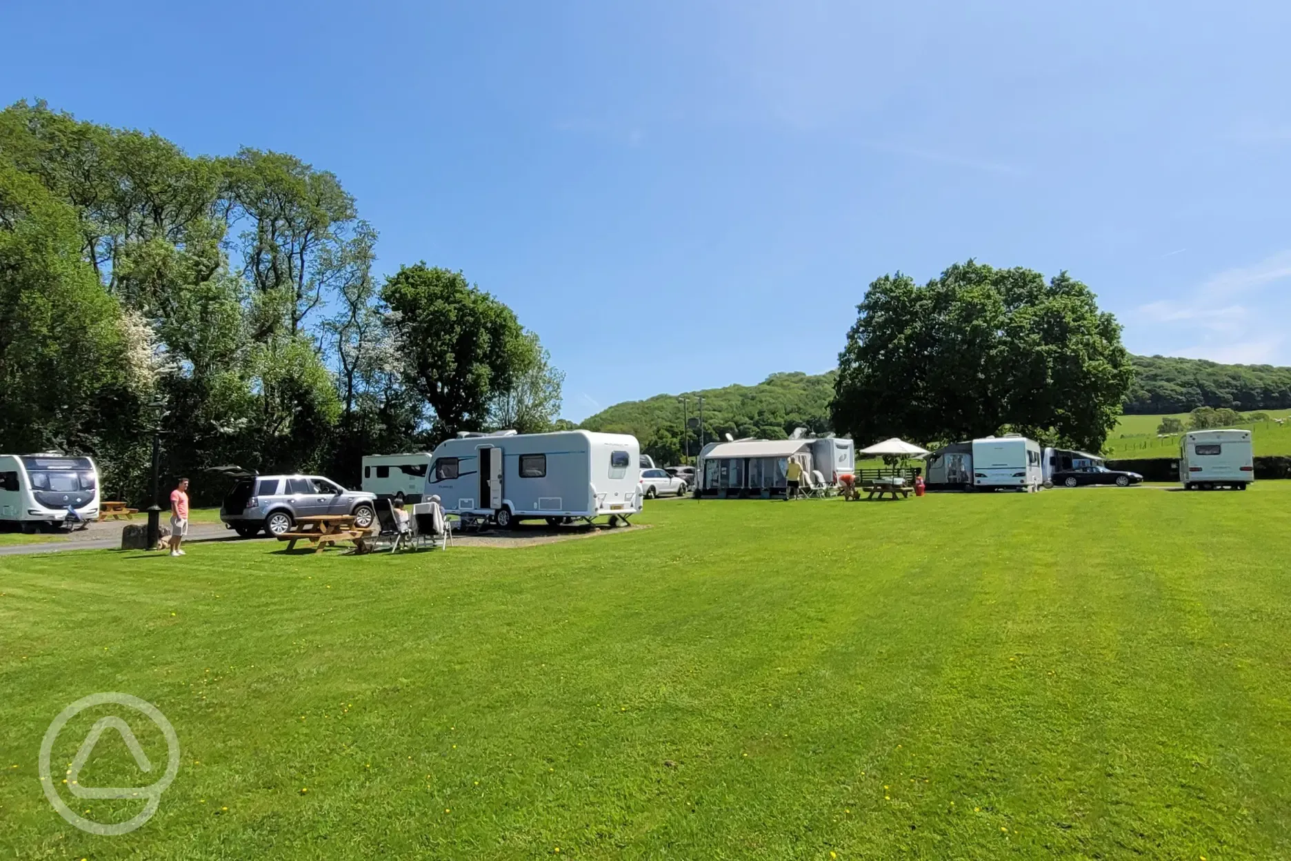 Electric hardstanding and grass touring pitches