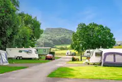 Electric hardstanding and grass touring pitches (5m x 10m) Electric hardstanding and grass touring pitches (5m x 10m)