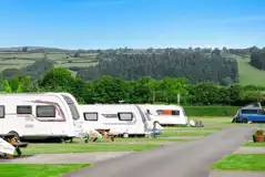 Electric hardstanding and grass touring pitches (5m x 10m) Electric hardstanding and grass touring pitches (5m x 10m)