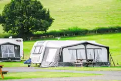 Electric hardstanding and grass touring pitches (5m x 10m) Electric hardstanding and grass touring pitches (5m x 10m)