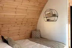 Pod double bed with bedding