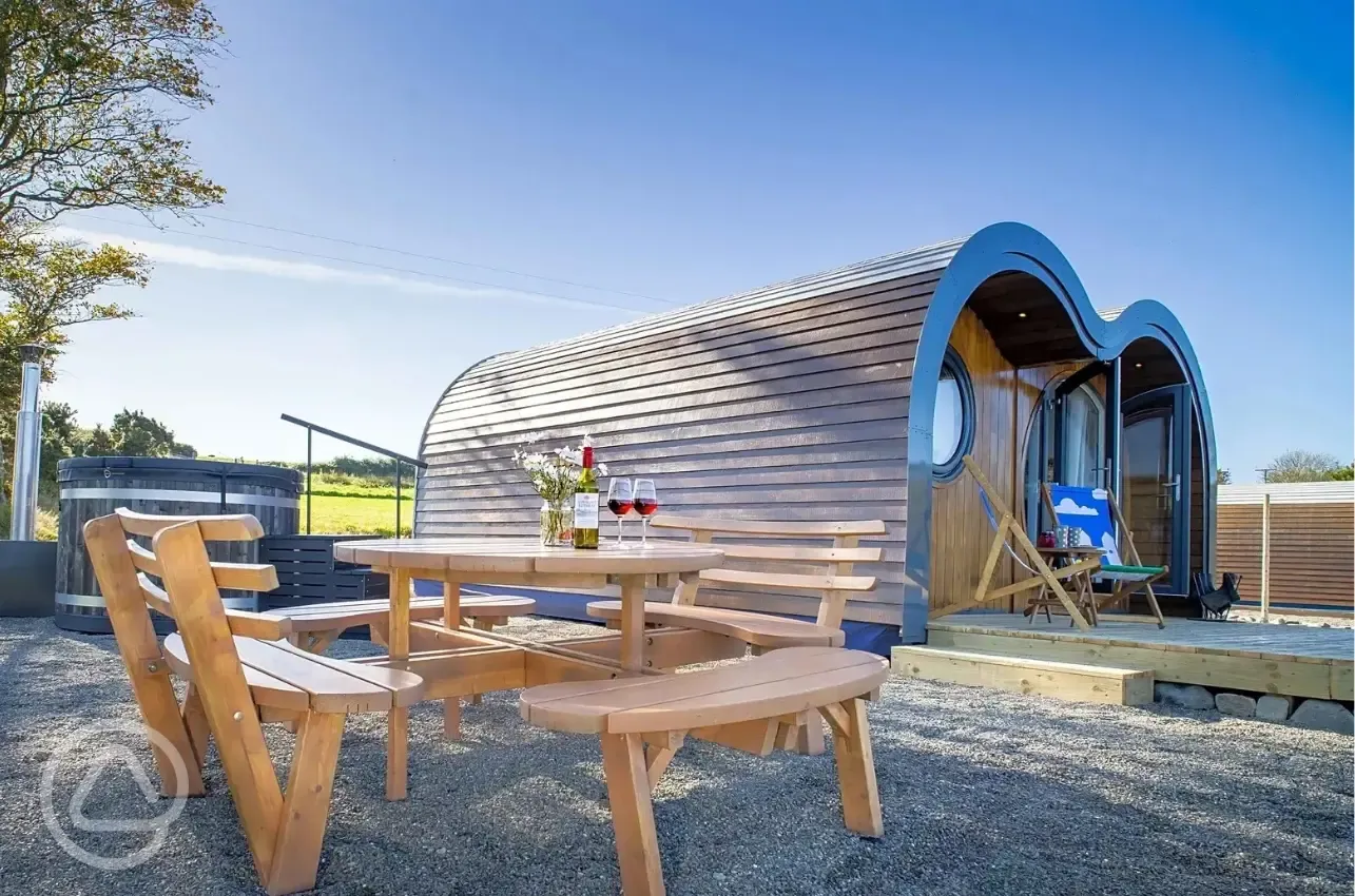 Madonna glamping pod and outdoor seating