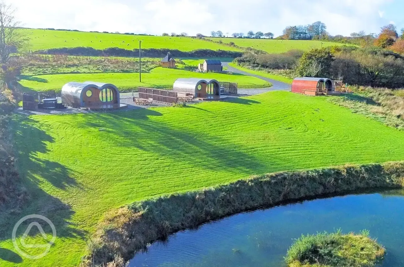 Glamping pods and pond views