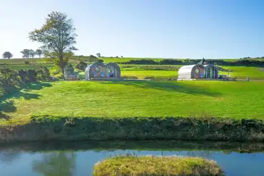 Glamping pods and pond views