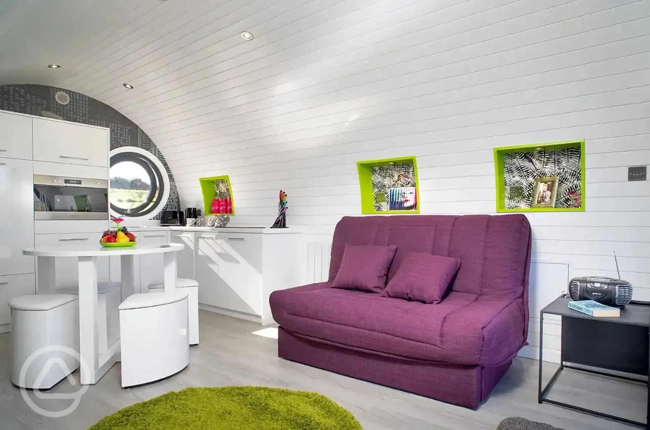 Madonna glamping pod living area and kitchen