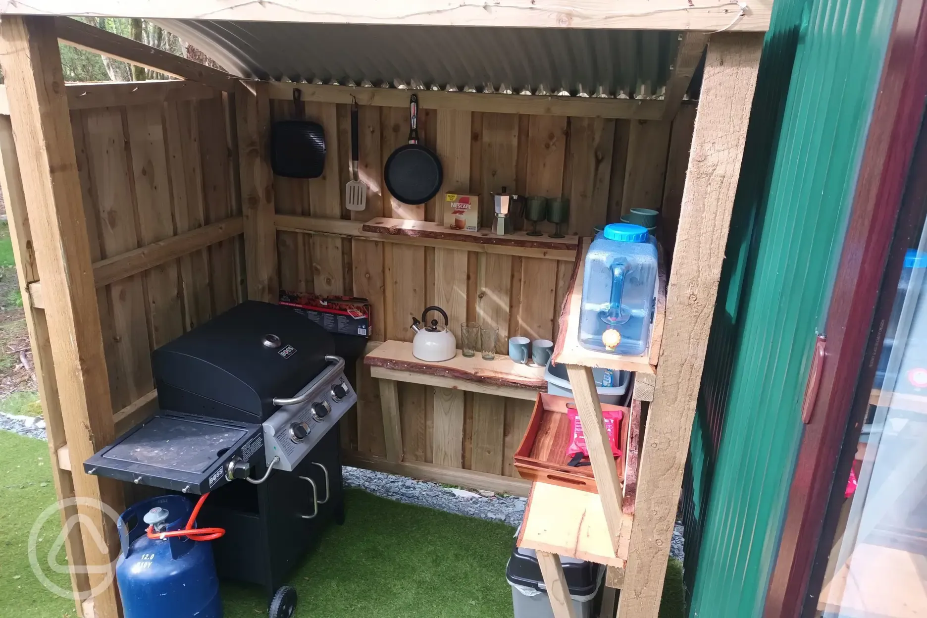 Glamping cabin outdoor cooking area