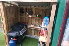Glamping cabin outdoor cooking area