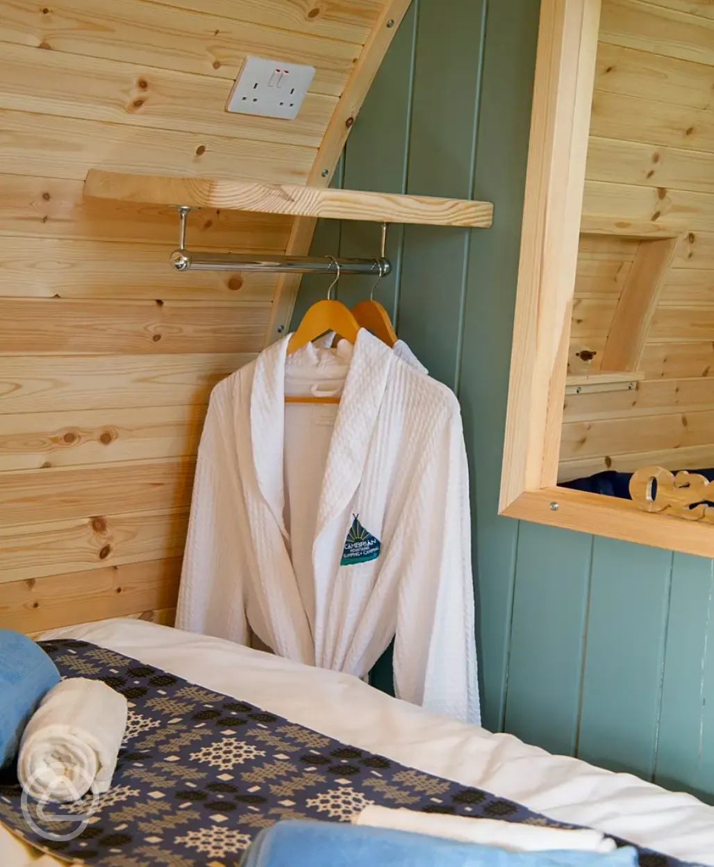 Robes provided in the glamping pods