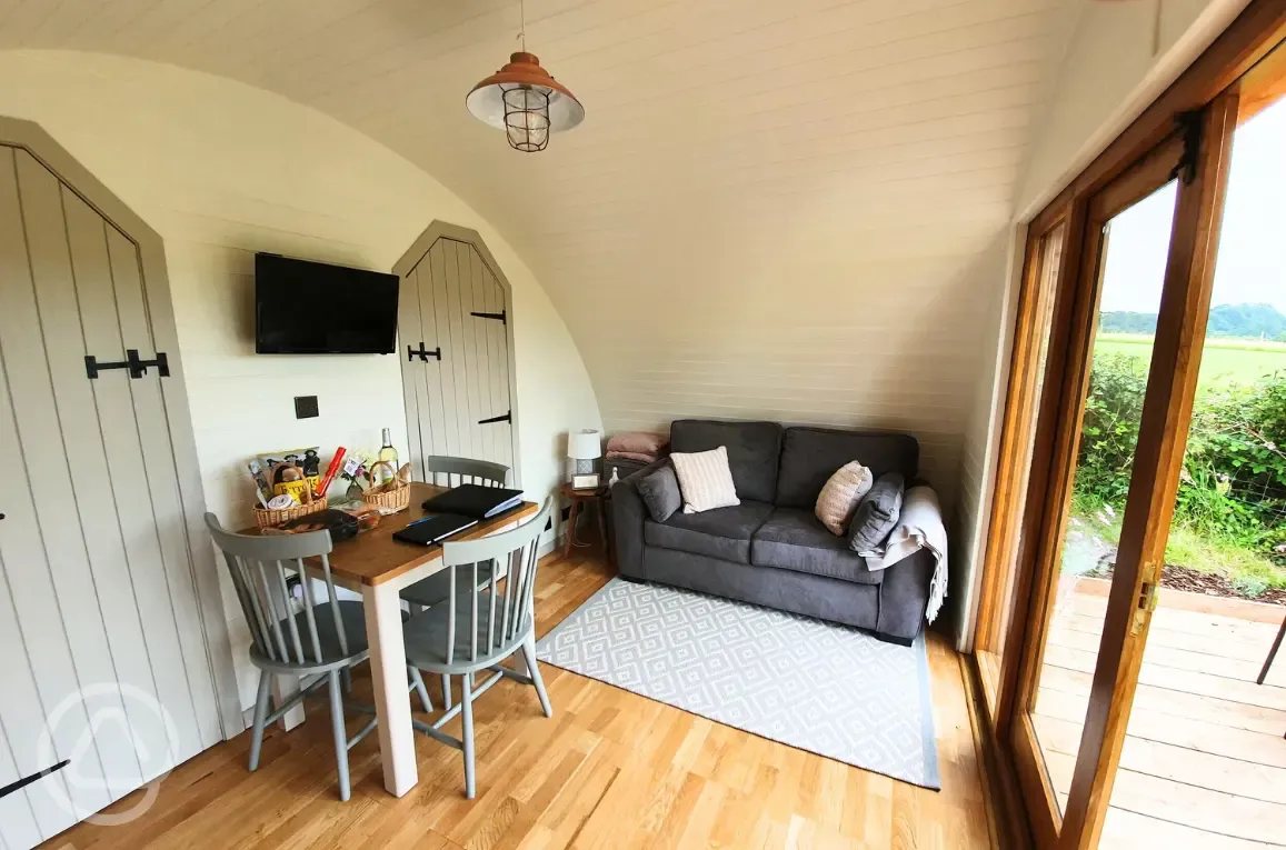 Towy glamping pod interior and sofa