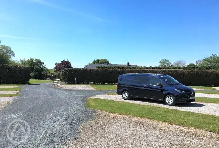 Electric hardstanding touring pitches with car parking space