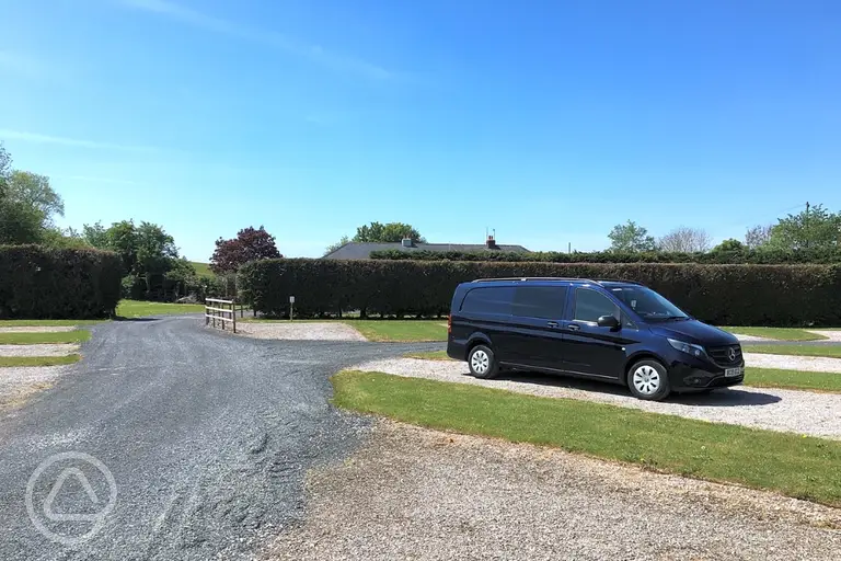 Electric hardstanding touring pitches with car parking space