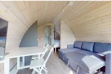 Ensuite glamping pod sofa bed unfolded (double)