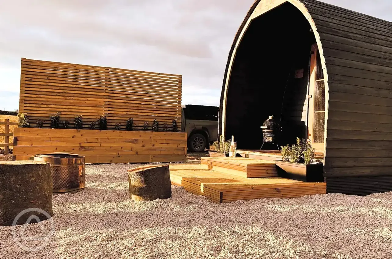 Camping pod and fire pit