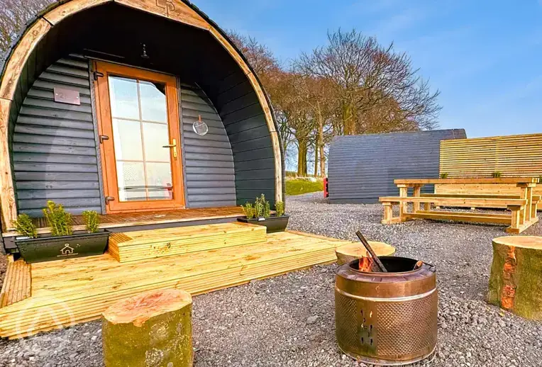 Camping pod and fire pit