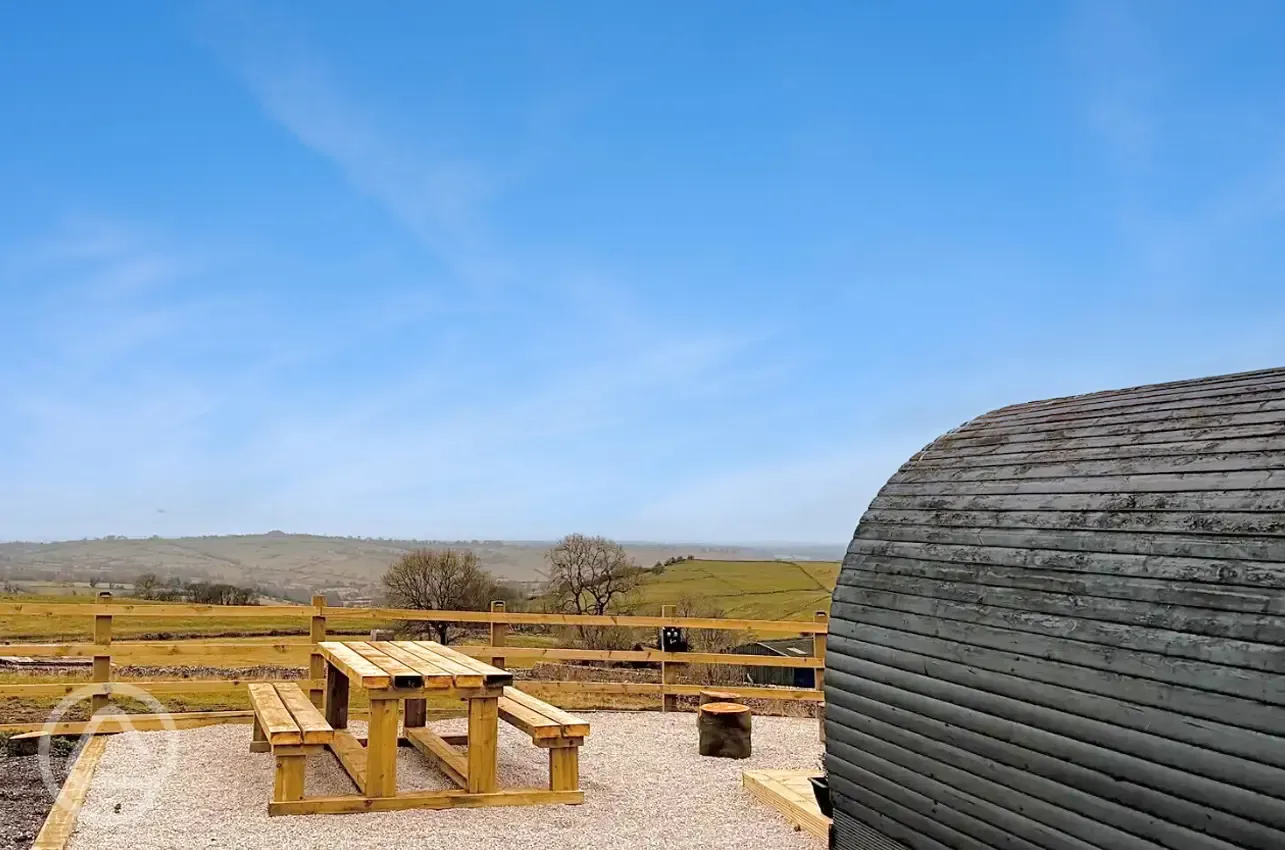 Camping pod and view over the site 