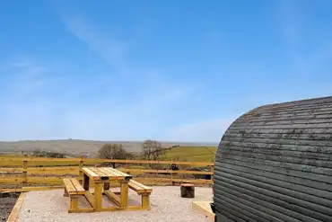 Camping pod and view over the site 