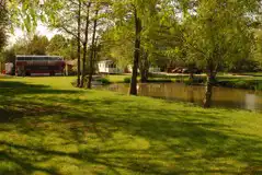 Grass pitches by the fishing lake Grass pitches by the fishing lake