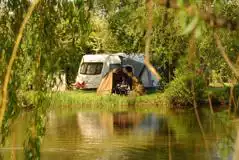 Grass pitches by the fishing lake Grass pitches by the fishing lake