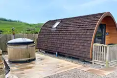 Glamping pod exterior with optional hot tub