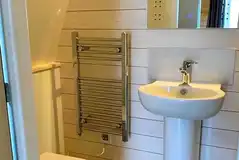 Glamping pod ensuite bathroom with toilet and shower