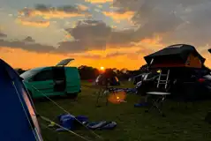 Non electric grass pitches at sunset
