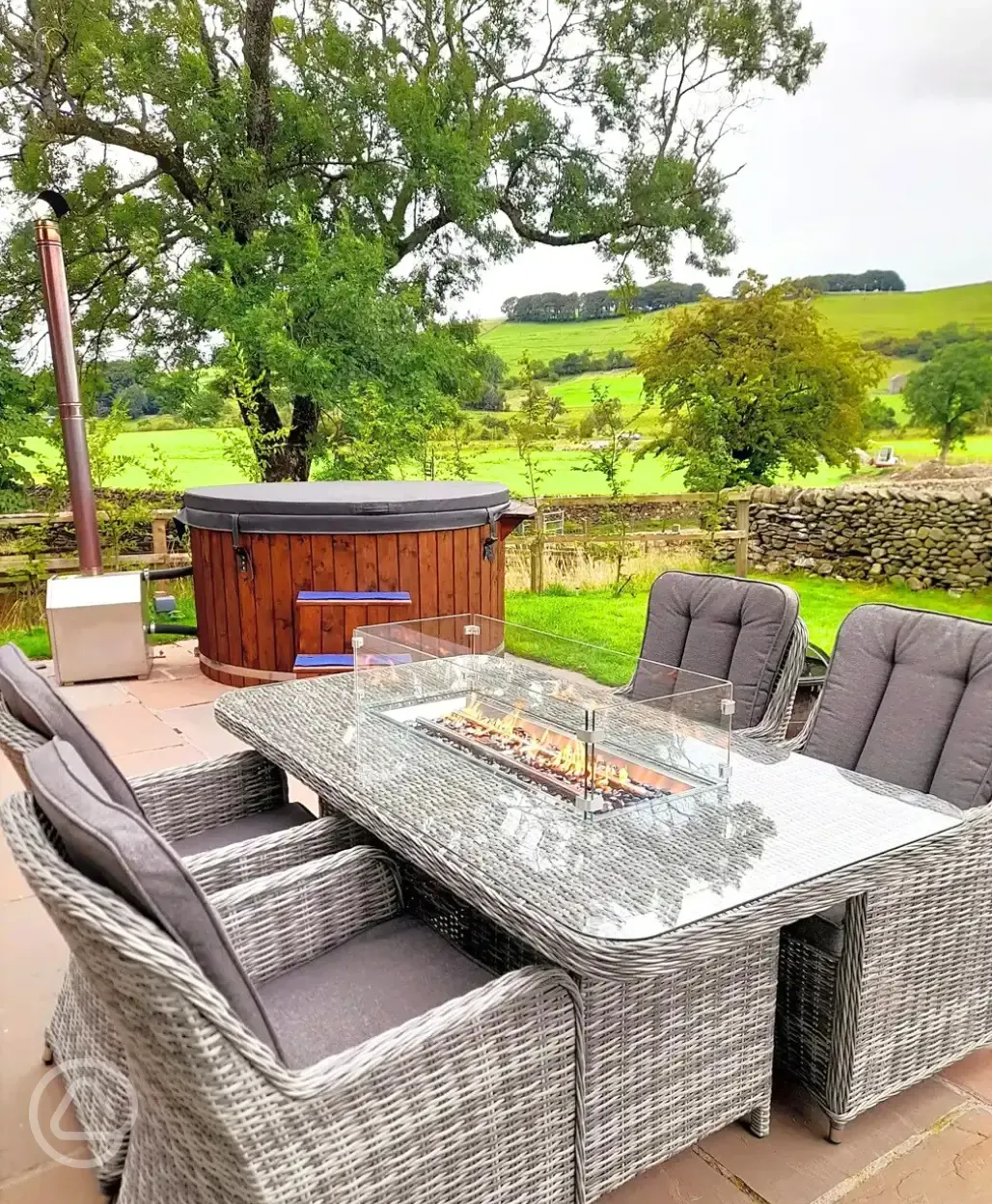 Glamping pod dining table and hot tub 