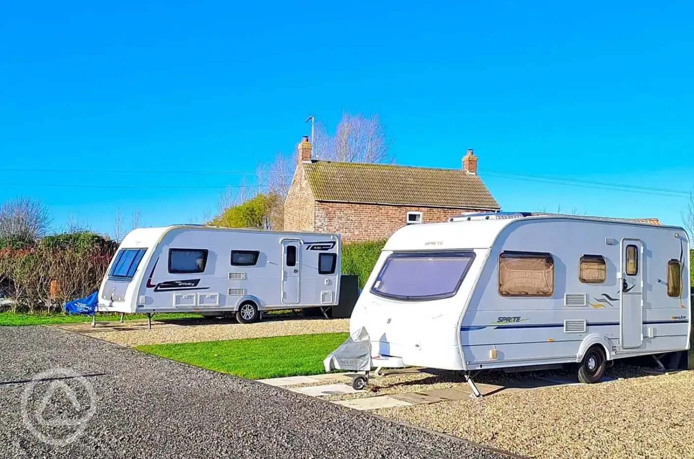 Fully serviced hardstanding touring pitches