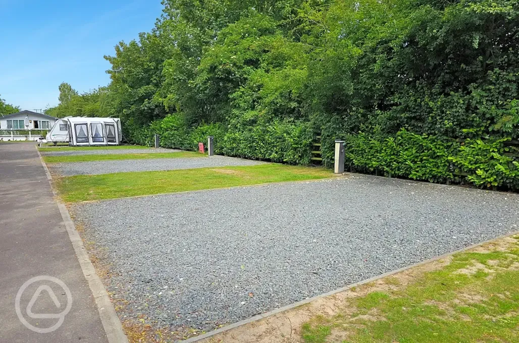 Caravan with awning on a fully serviced hardstanding pitches at Roach Farm Park Caravan with awning on a fully serviced hardstanding pitches at Roach Farm Park