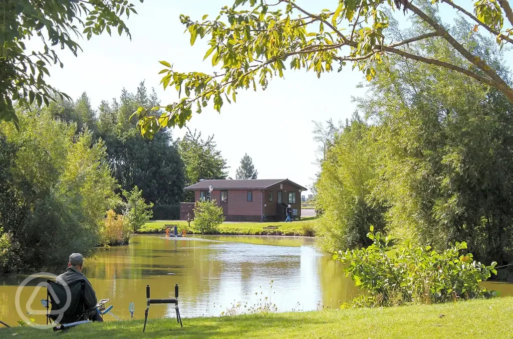 Fishing lake and facilities block in the distance Fishing lake and facilities block in the distance