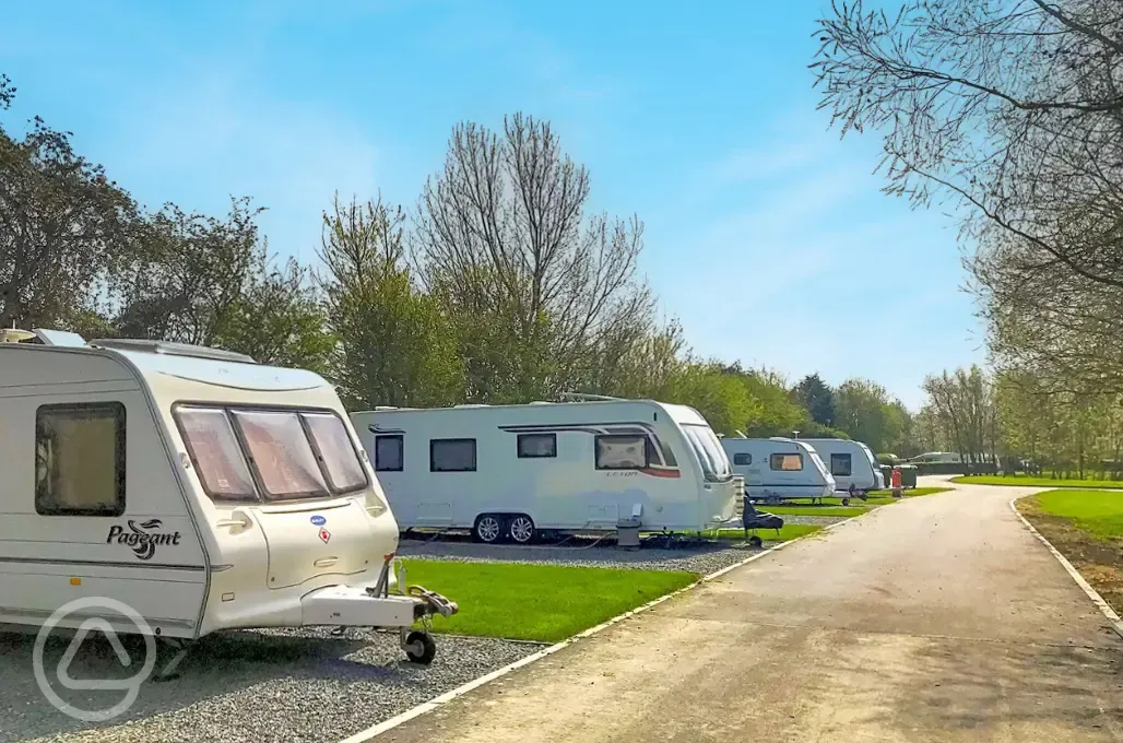 Tourers on fully serviced hardstanding pitches at Roach Farm Park Tourers on fully serviced hardstanding pitches at Roach Farm Park