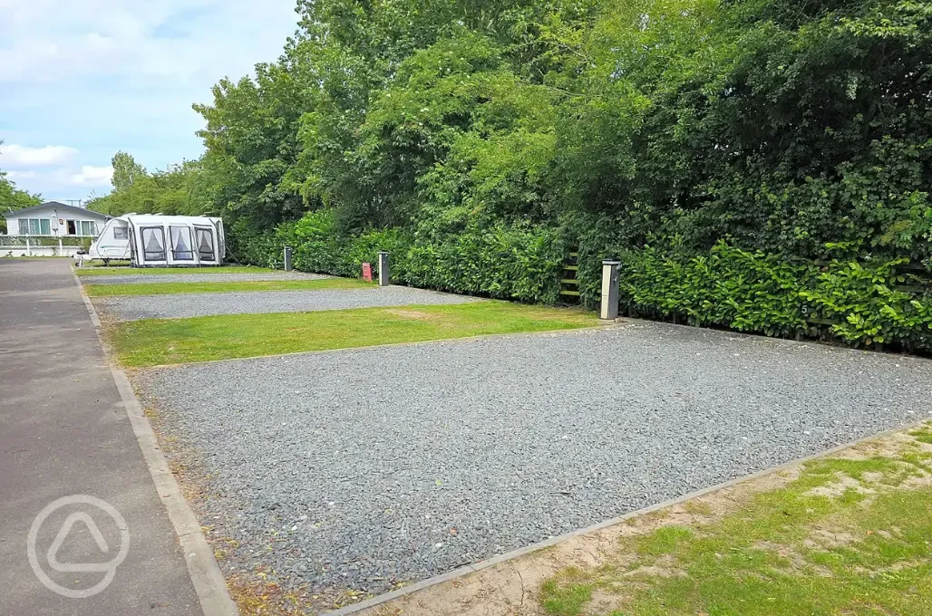 Caravan with awning on a fully serviced hardstanding pitches at Roach Farm Park Caravan with awning on a fully serviced hardstanding pitches at Roach Farm Park