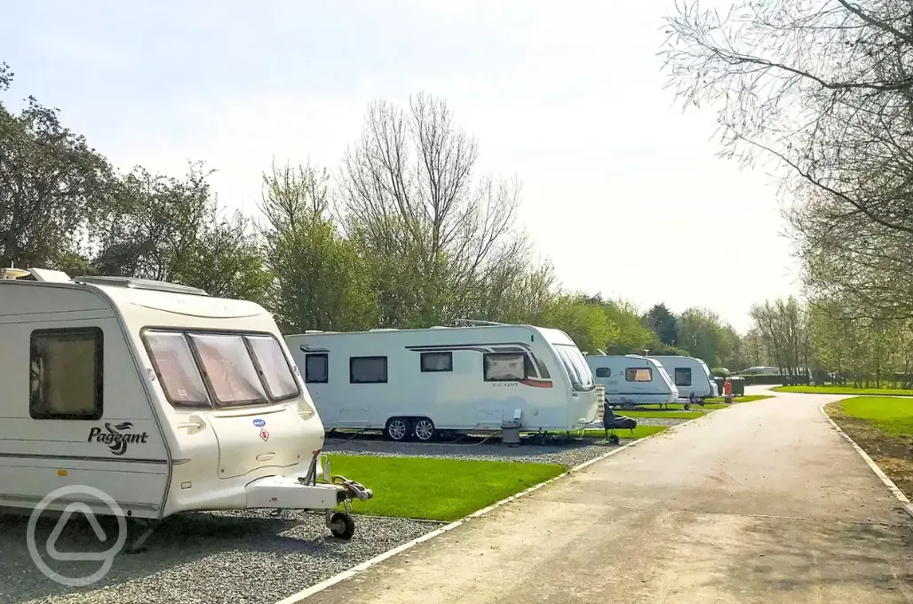 Tourers on fully serviced hardstanding pitches at Roach Farm Park Tourers on fully serviced hardstanding pitches at Roach Farm Park