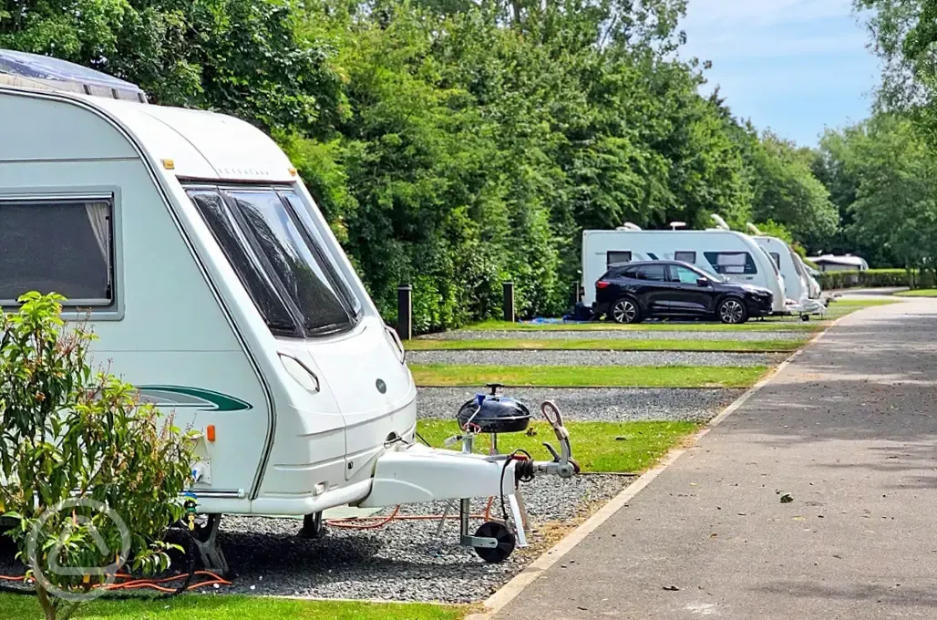 Tourers on fully serviced hardstanding pitches at Roach Farm Park Tourers on fully serviced hardstanding pitches at Roach Farm Park