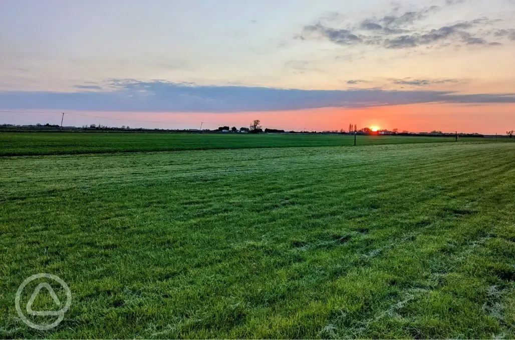 Sunset over the grass pitches 