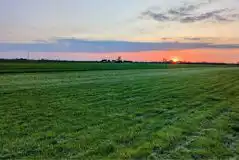 Sunset over the grass pitches Sunset over the grass pitches