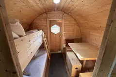 Camping pod bunk beds and seating area Camping pod bunk beds and seating area